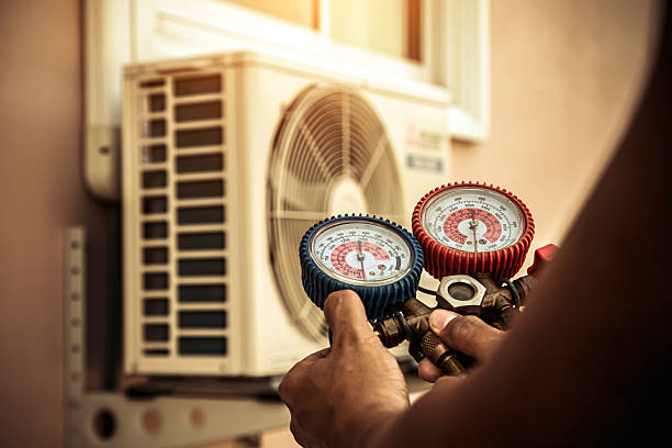 Professional Hvac technician working in Rapid City, MI
